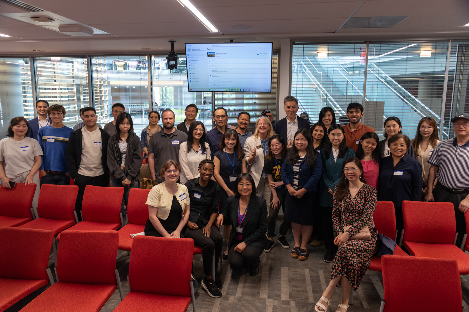 A large group photo of attendees and organizers at the close of the Asian Focus Career Conference.